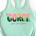 A mint green racerback tank top featuring a colorful graphic on the front that reads 'The GORGE Labor Day Weekend' with a landscape design inside the letters, displayed on a clean white background.